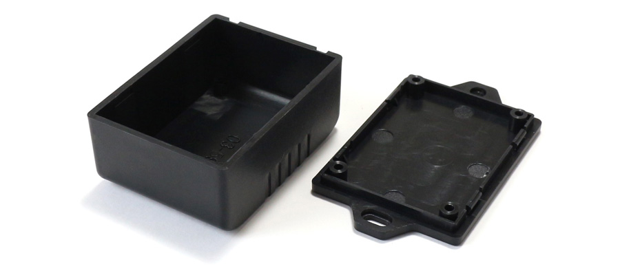 Boîtier plastique pour composants électroniques